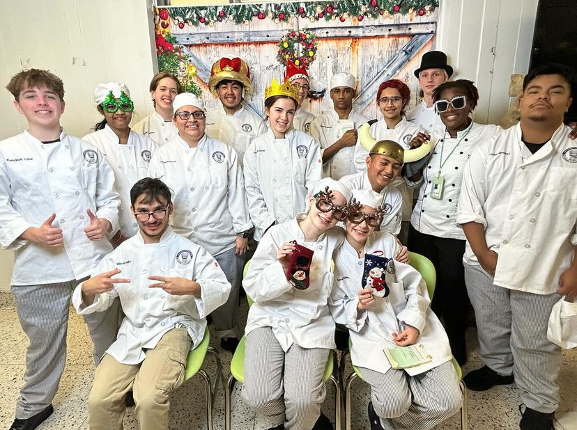 the culinary team posing near christmastime